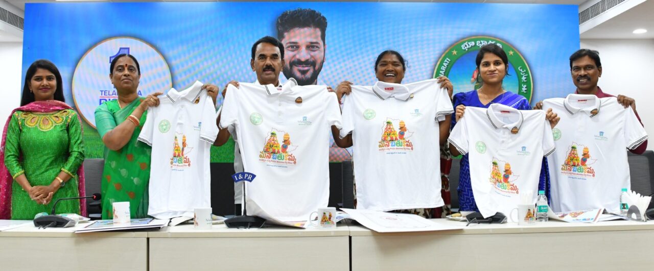 Telangana officials unveil Bathukamma festival T-shirts during a press meet in Hyderabad – Fridaywall Magazine coverage of Telangana’s floral festival celebrations